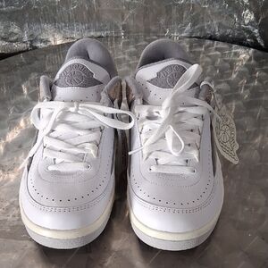 Jordan White and Gray Sneakers Classic Low-Top Design